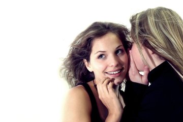 Woman whispering to another woman How to Market Your Self-Published Book: Tried and Tested Strategies to Increase Sales Part One