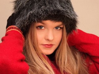 A woman in a red coat