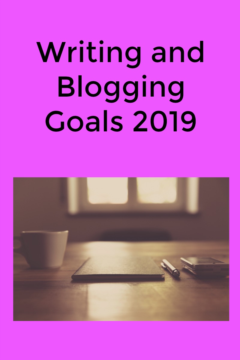 Blogging goals 2019 in black text on a pale purple background with an image of a coffee cup, a pad and pen and a cell phone