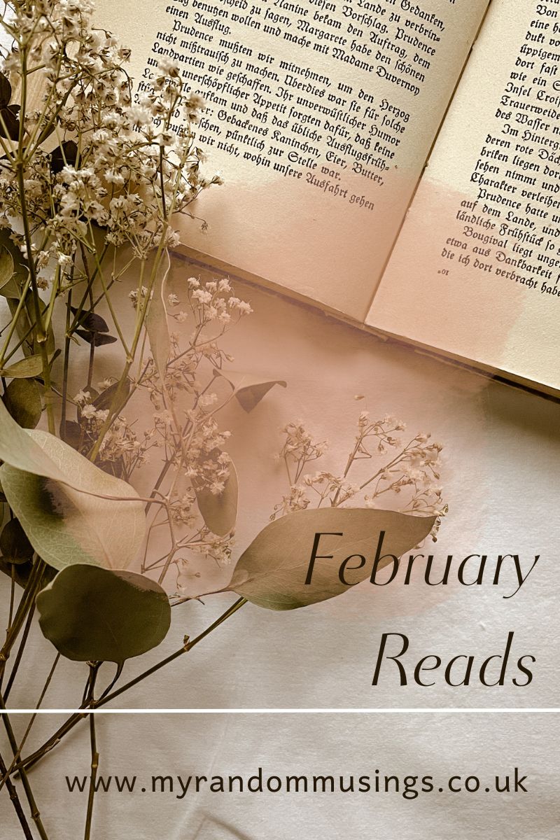 February reads on a beige background with an open book and some foliage