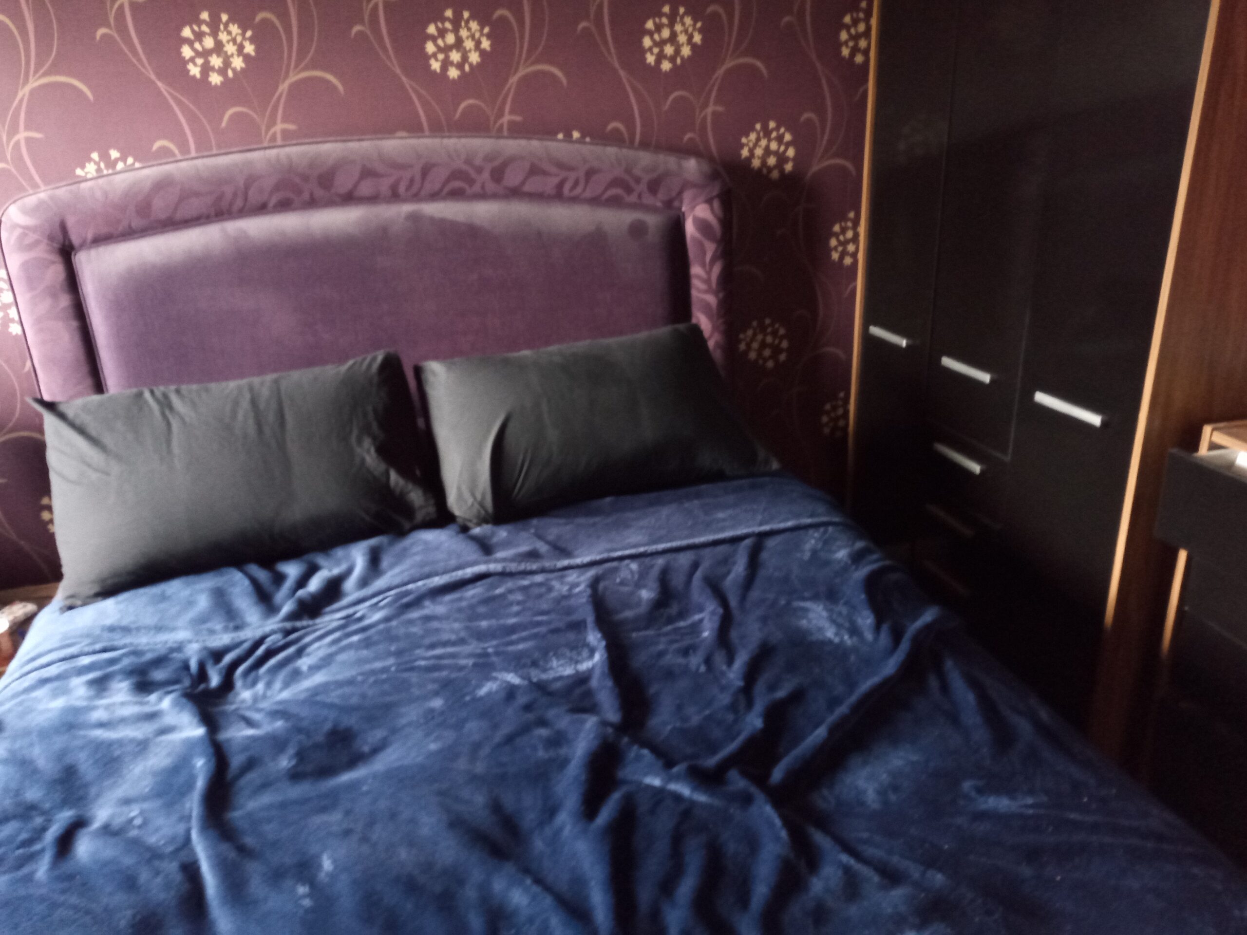 SImba Hybrid Firm Pillows on a made bed